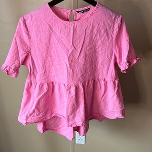 Pink peplum top
